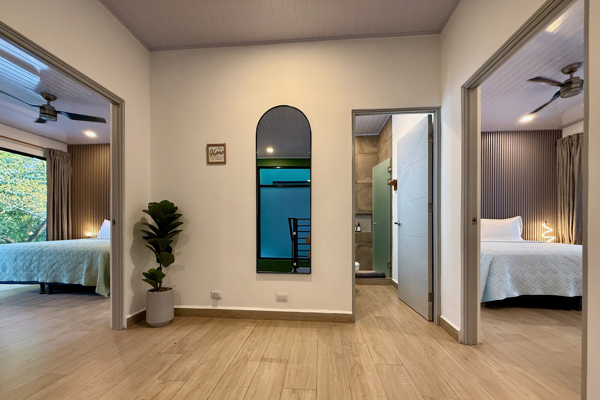 Upstairs: Three bedrooms per house. Six bedrooms total for the group.