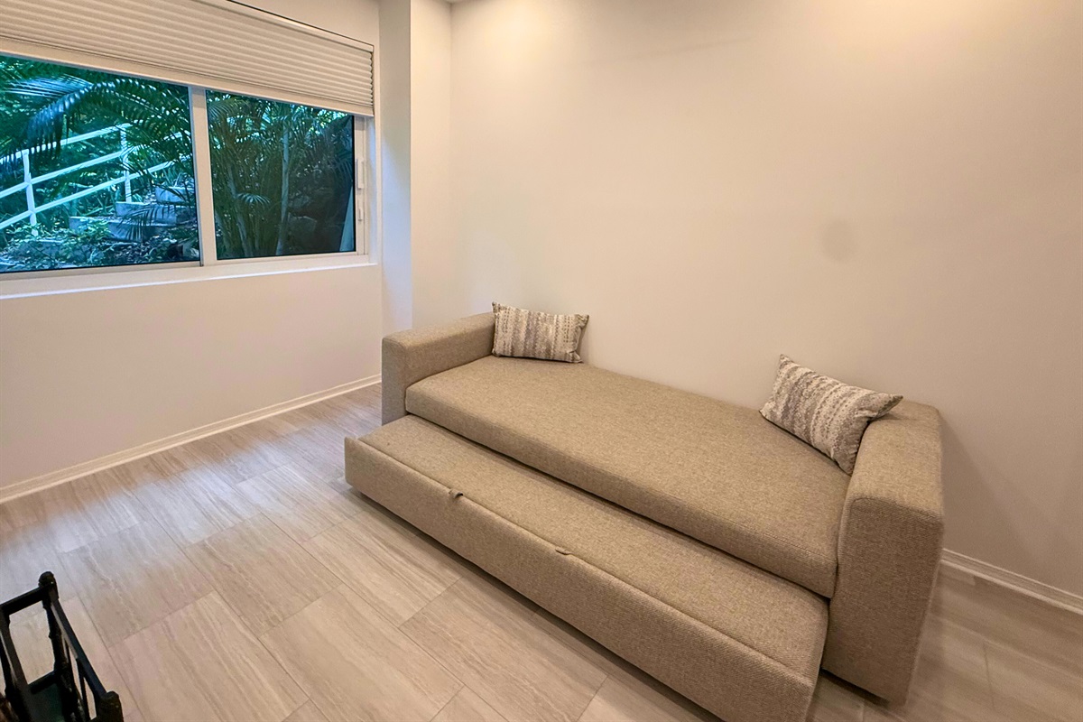 The couch converts to a trundle bed and is perfect for children