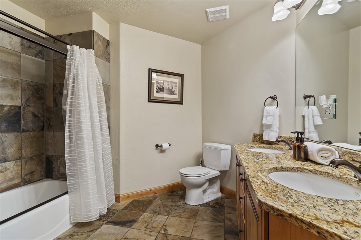 Well-appointed bathroom with modern finishes and a clean, elegant design.