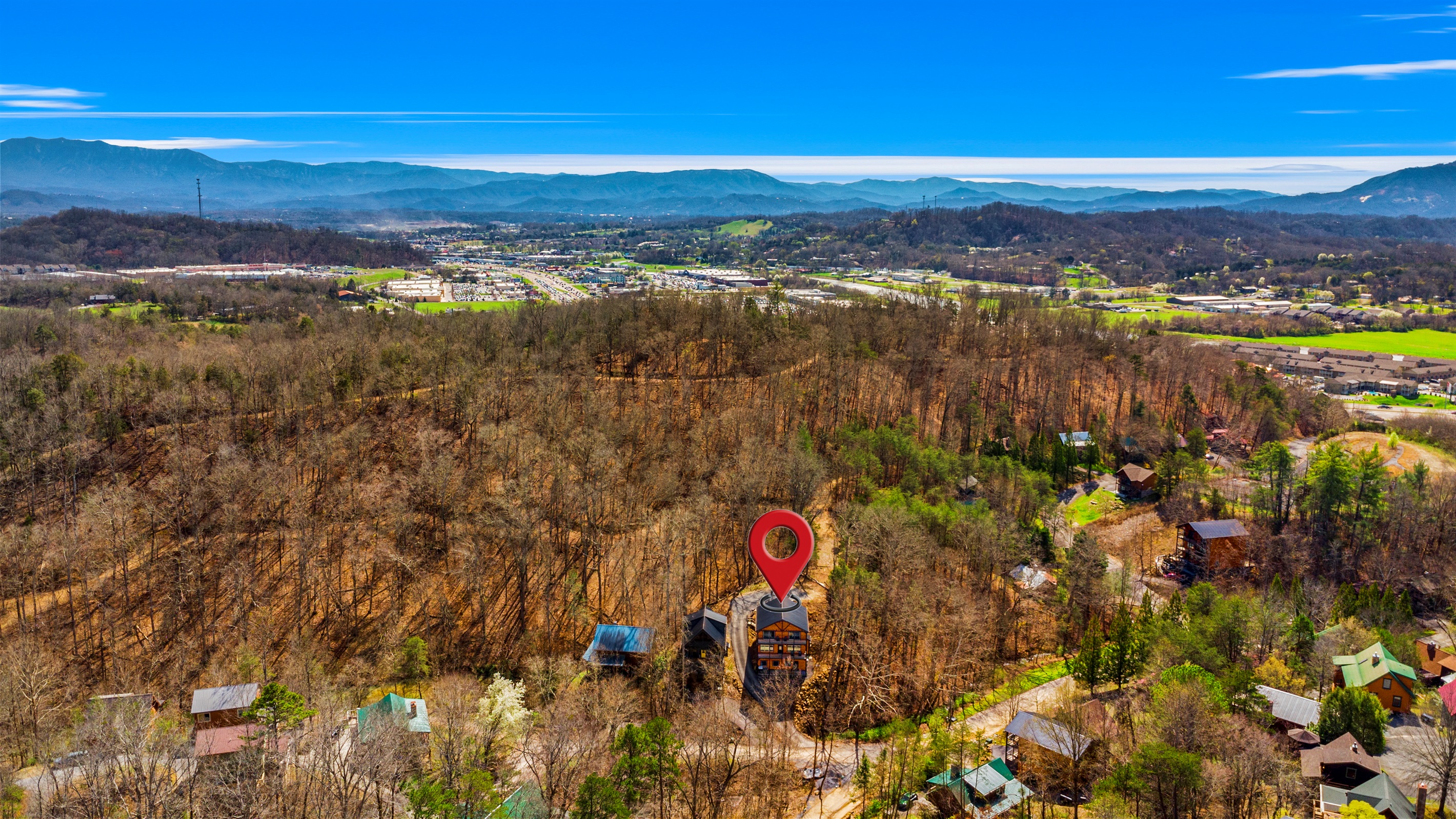 Immerse yourself in nature in a home completely surrounded by lush, mature trees, offering ultimate privacy and a true mountain escape