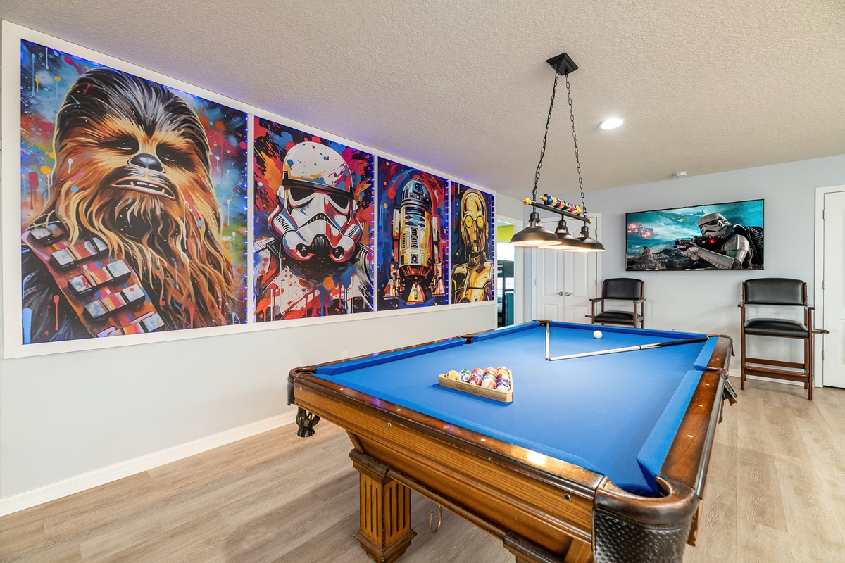 Play a game of pool while watching the game!