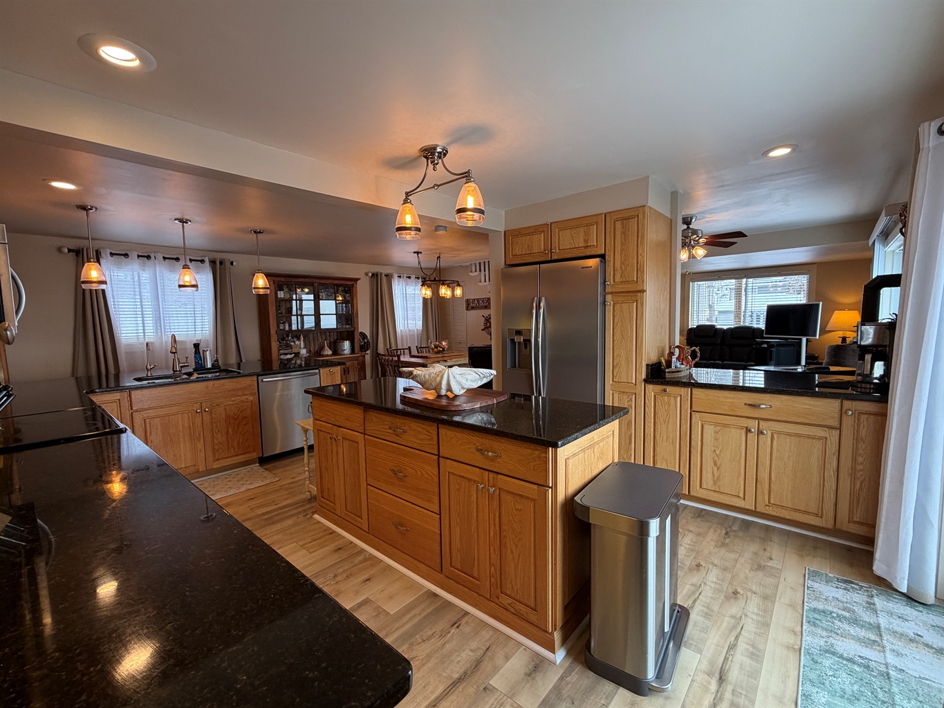 Kitchen with granite counter tops and large island