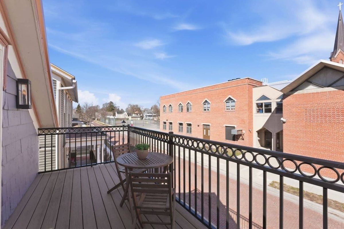 Enjoy elevated views from the balcony, offering a peaceful spot to unwind