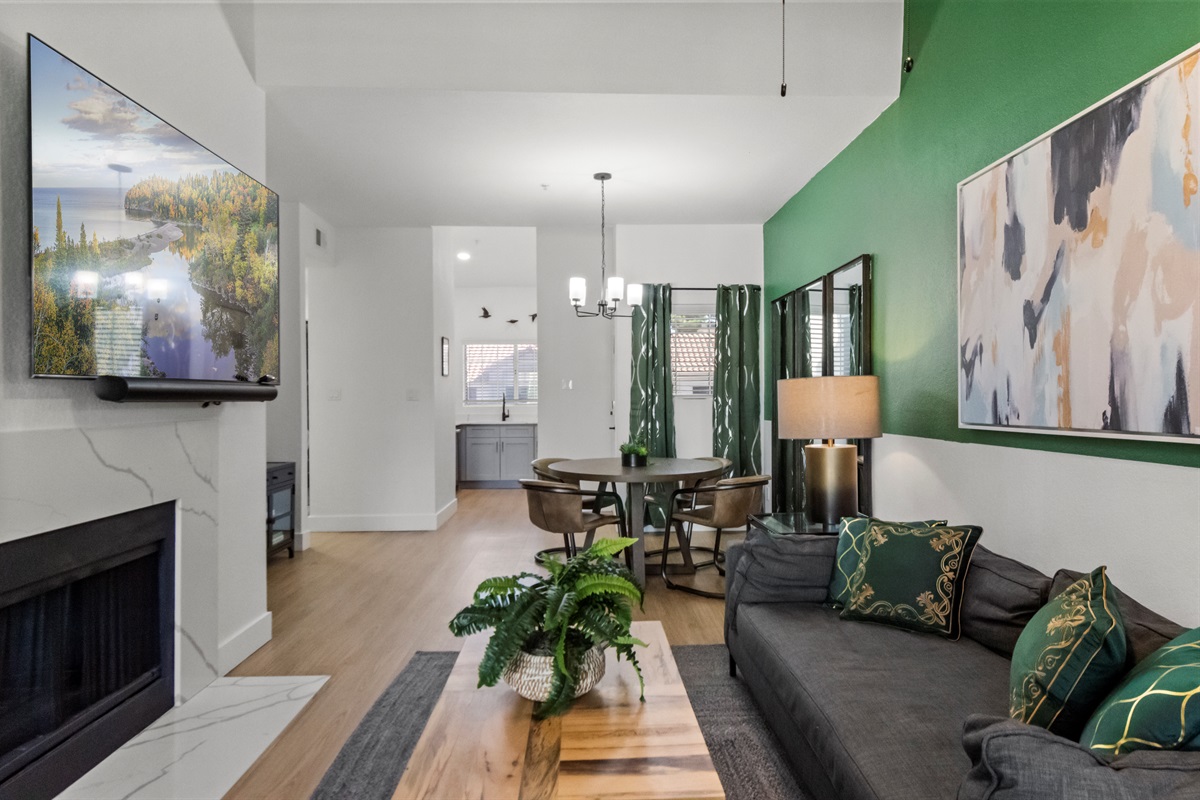 Enjoy movie nights and seamless connectivity in our comfortable living room.