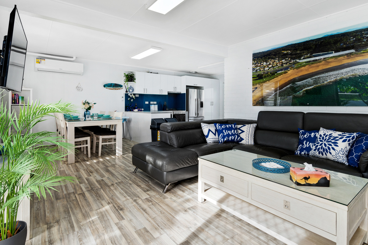 This downstairs living area gives Skye’s Beach House another TV and lounge space beside the lower kitchen and dining zones.