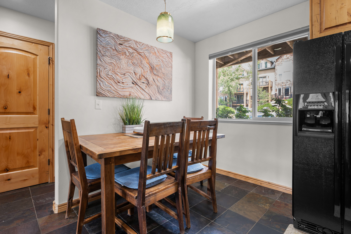 Enjoy meals together with seating for five at the dining table, plus four more at the kitchen bar