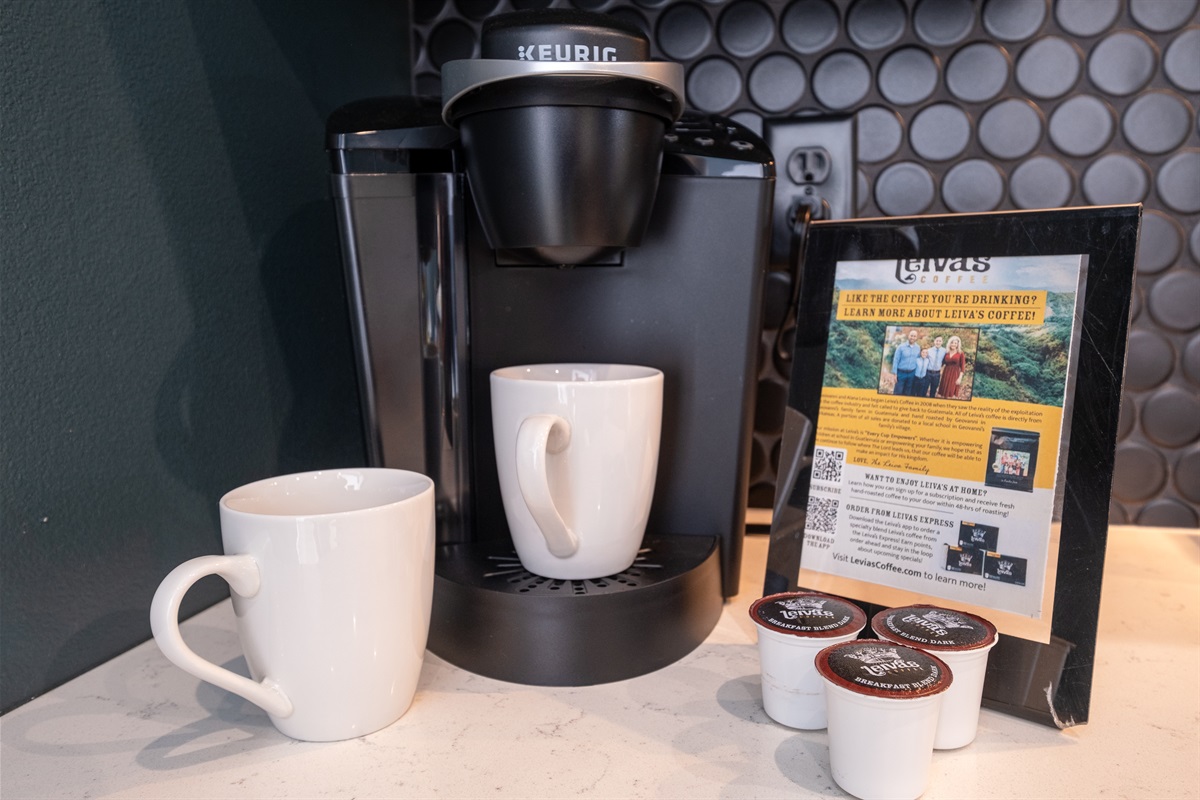 The kitchen features a Keurig coffee machine where you can enjoy a quick coffee before you start your day.