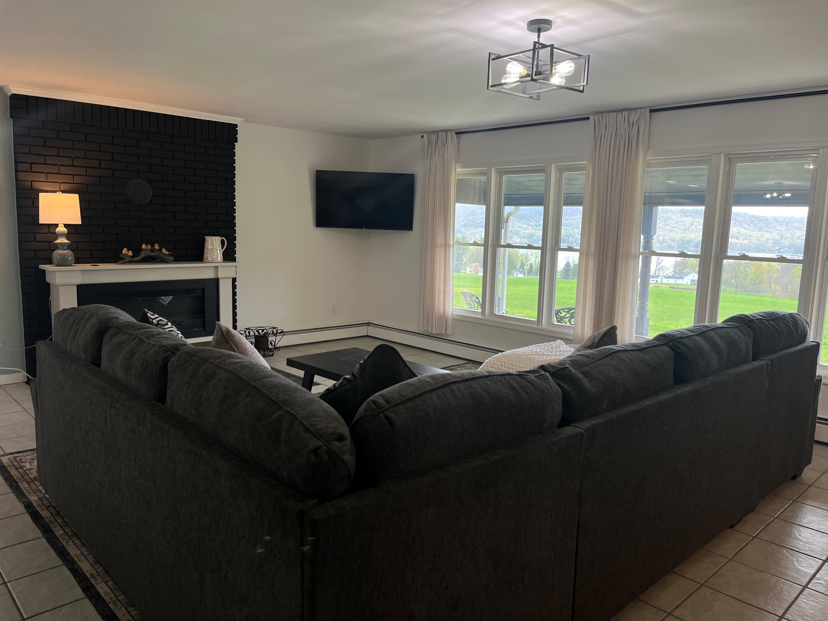 Living room with electric fireplace and SmartTV