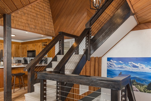 Go down another flight of stairs to discover two more bedrooms, one with an ensuite and the other with a separate bathroom.