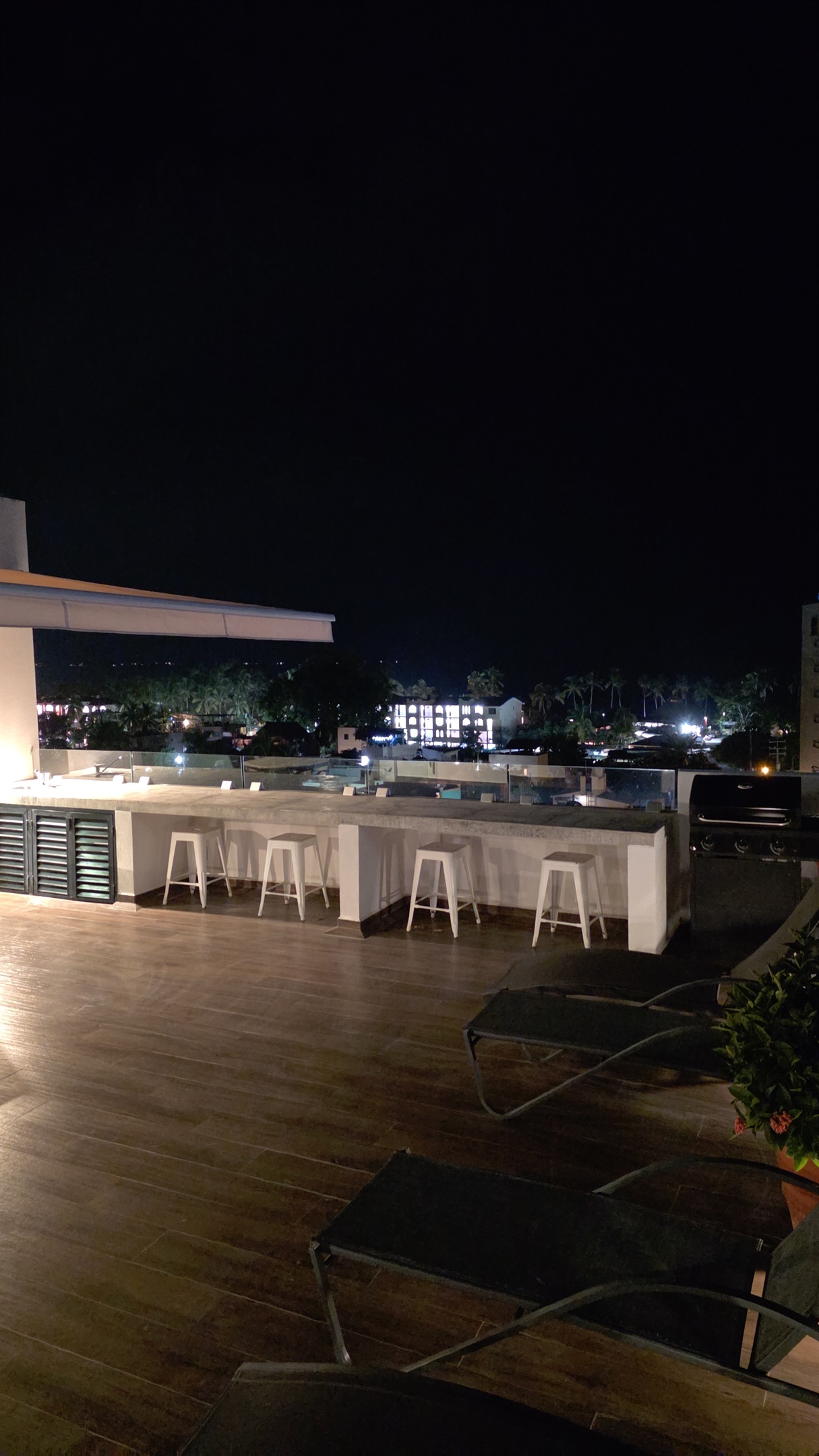 Roof top hang out with views of Banderas Bay and Puerto Vallarta on the left