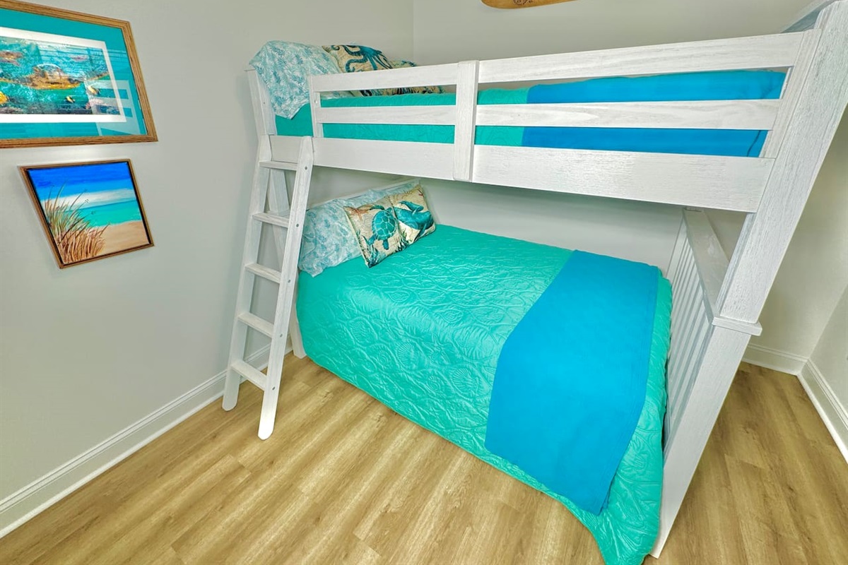 Full-size bunk bed and blackout curtains.