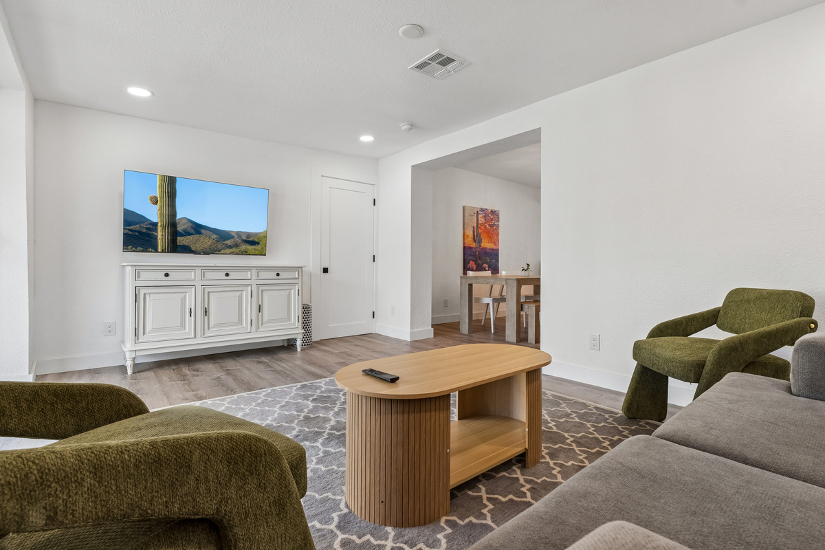 Relax and escape in the family room with a 55" flat screen TV