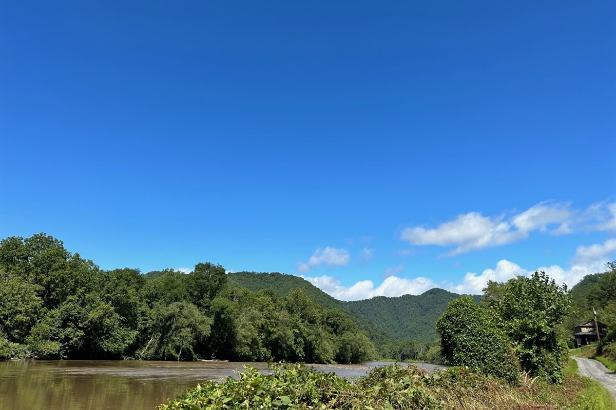The French Broad River and the road in front of the house