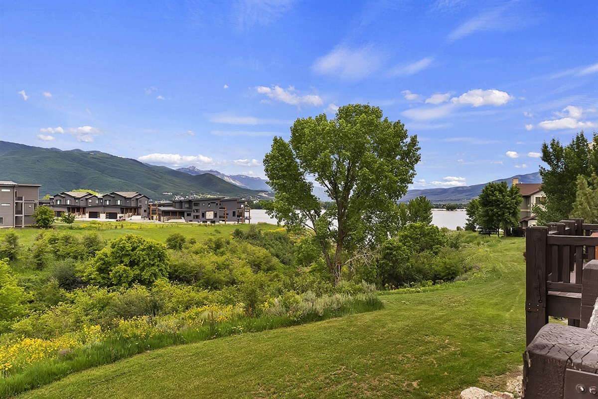 Open green space with views of the surrounding valley.