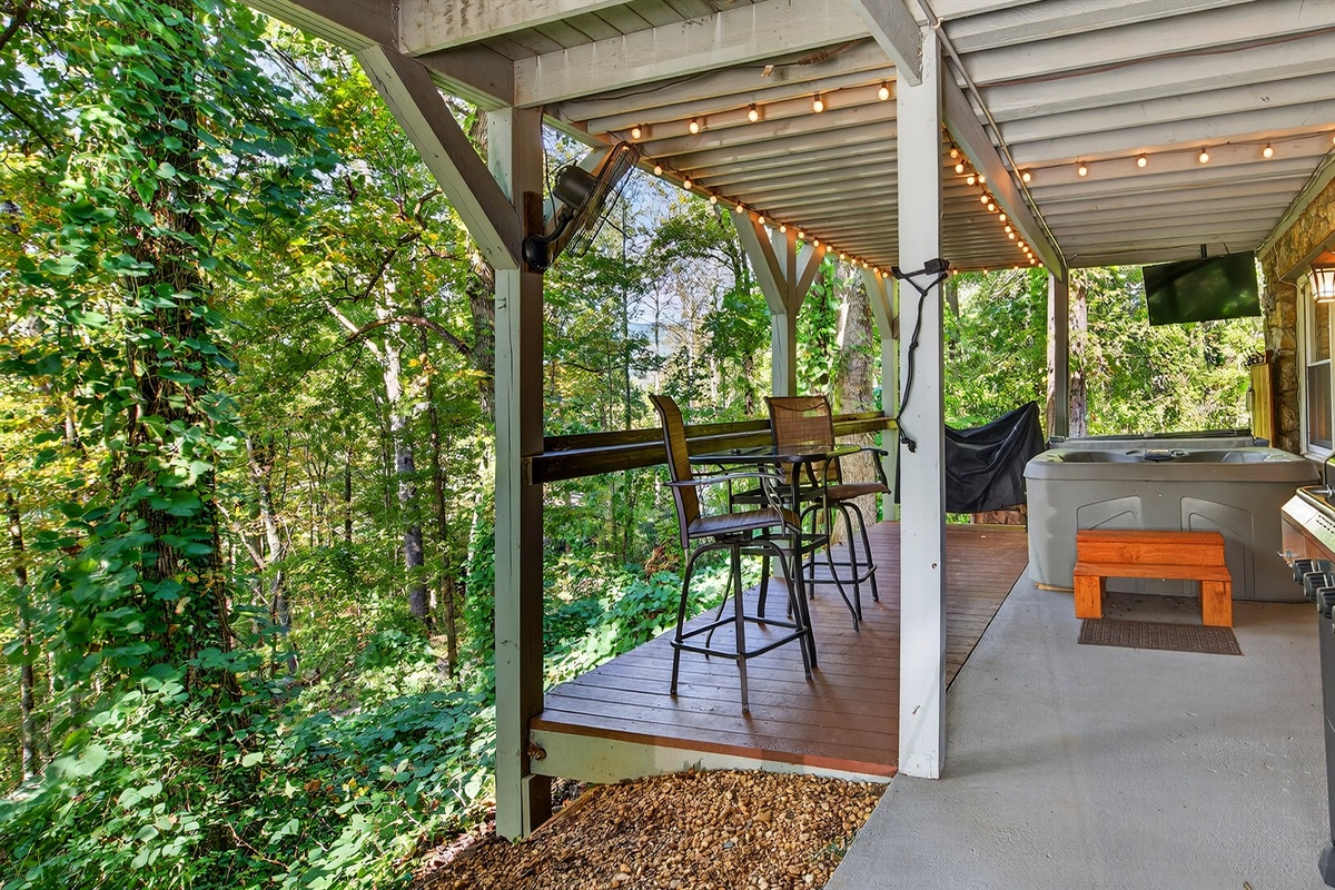 Enjoy a movie from the hot tub, with an outdoor TV.