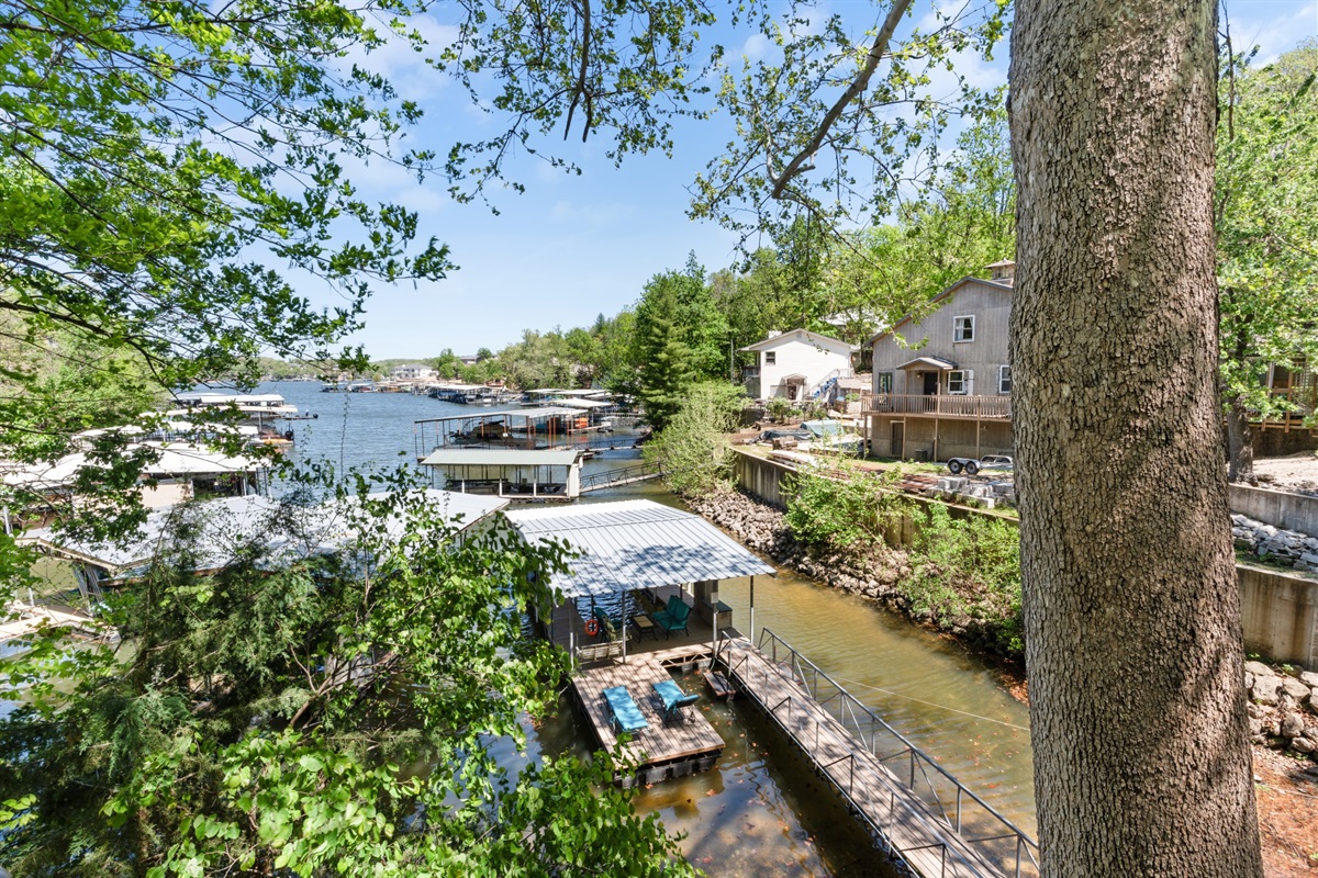 Surrounded by trees, with peek-through lake views that remind you why you&rsquo;re here.