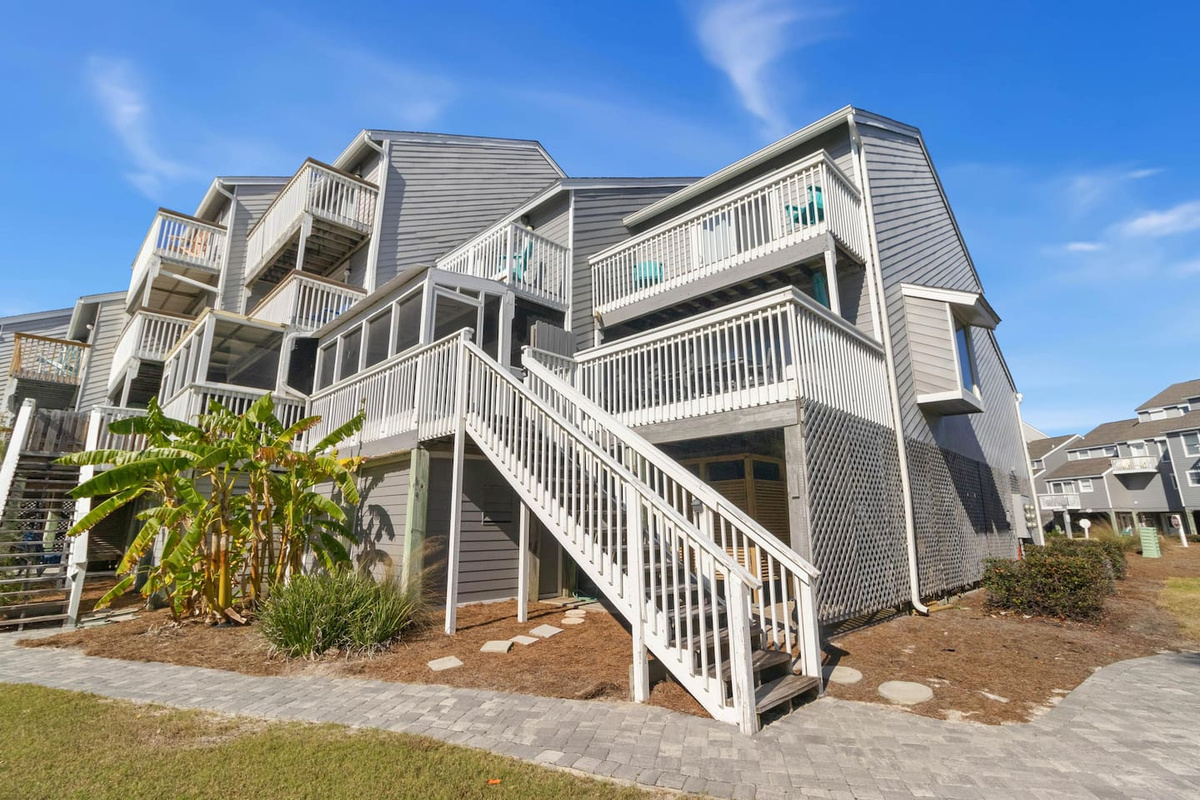 Explore two full floors, two private decks, and Gulf views that stretch from every level &mdash; the layout gives each floor its own outdoor space and its own rhythm.