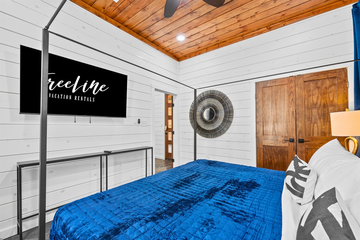 A warm and welcoming king bedroom with a soft color palette and plush bedding for ultimate relaxation.