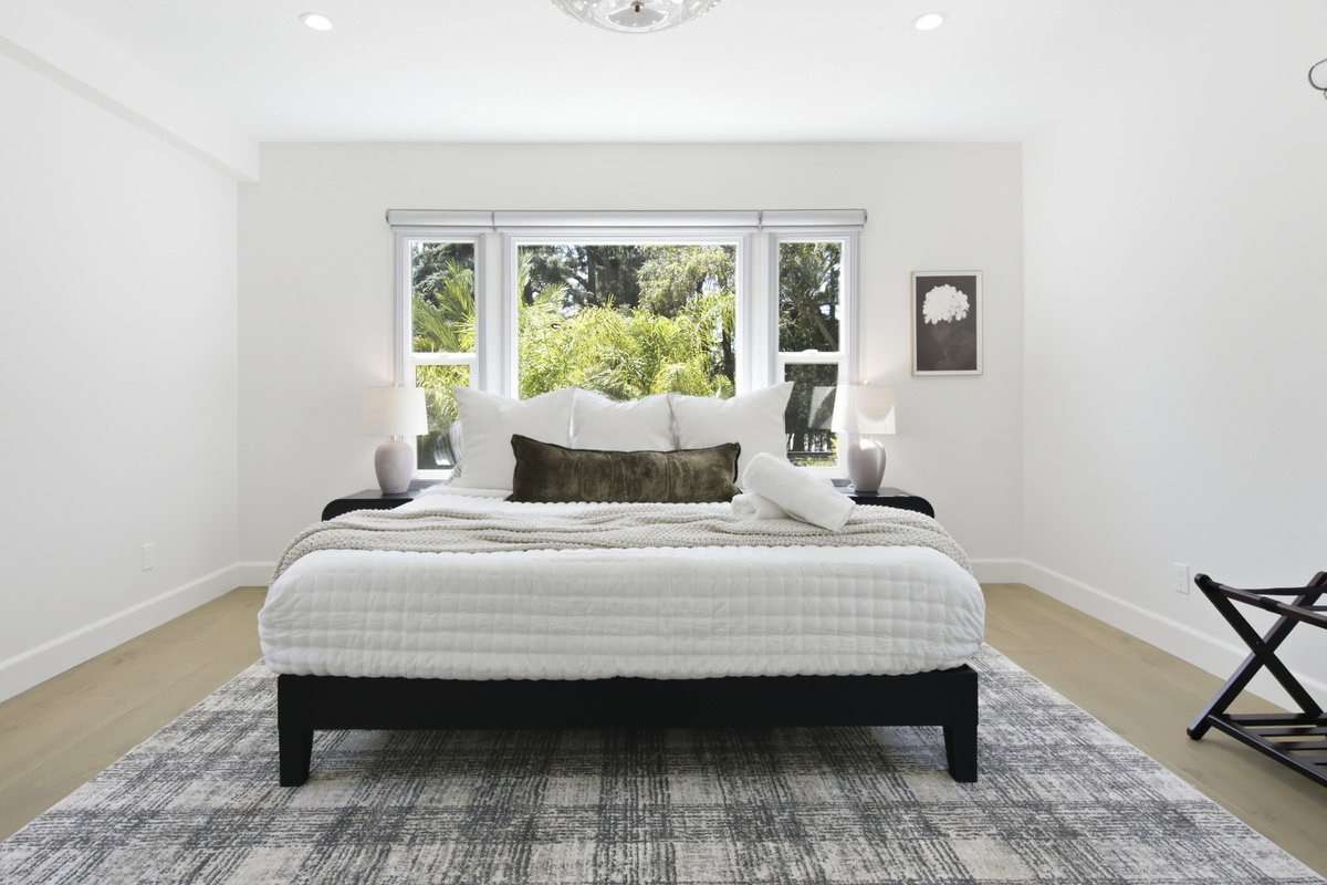 Elegant details, cozy comforts, and a peaceful atmosphere make this bedroom the perfect getaway retreat.