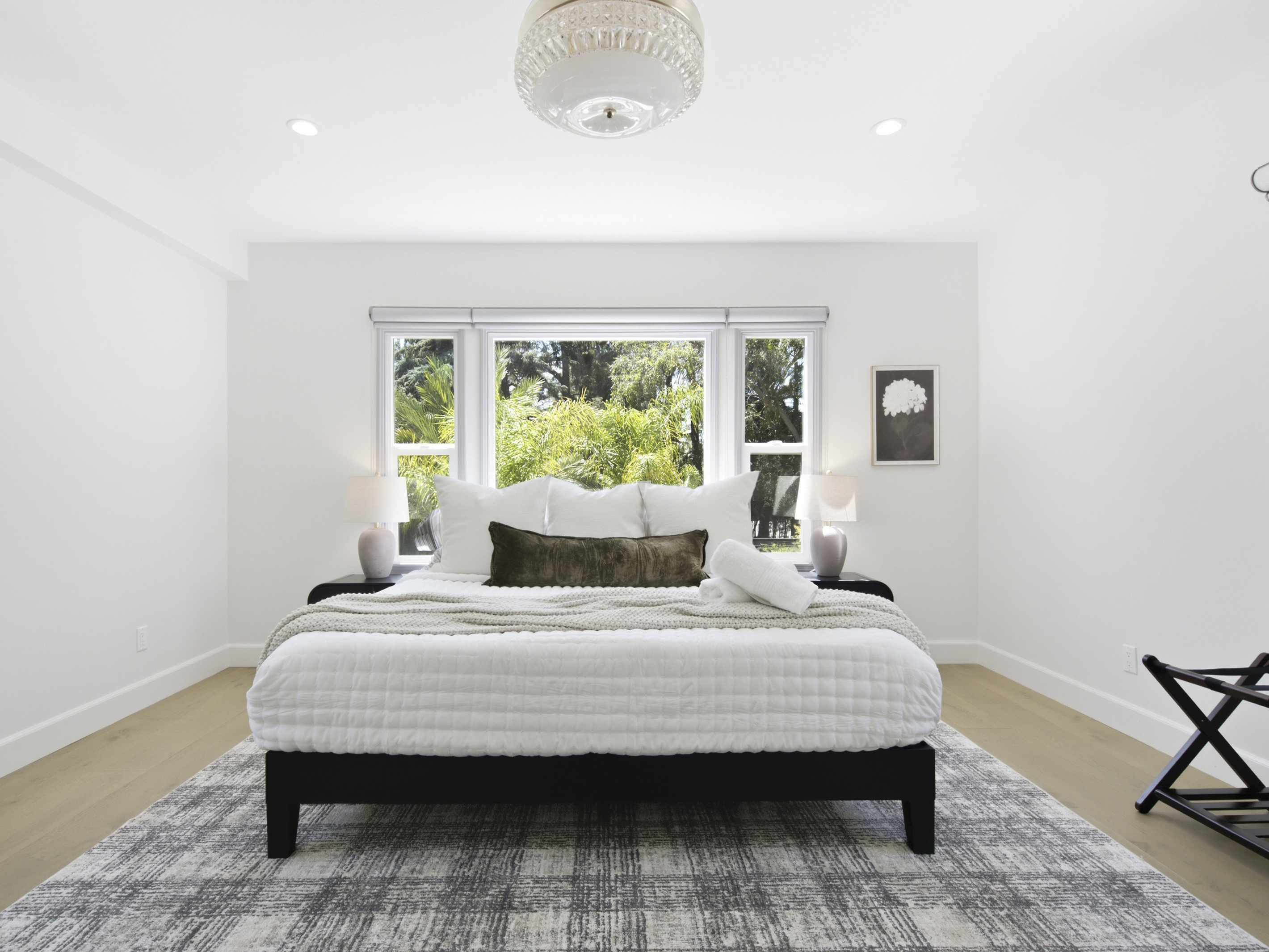 Elegant details, cozy comforts, and a peaceful atmosphere make this bedroom the perfect getaway retreat.