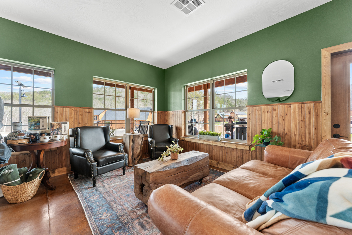 Sink into leather sofas in the lodge lounge for movie night after a full day outdoors.