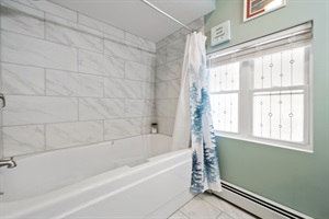 Oversized soaking tub with bath salts and candles. Your own spa!