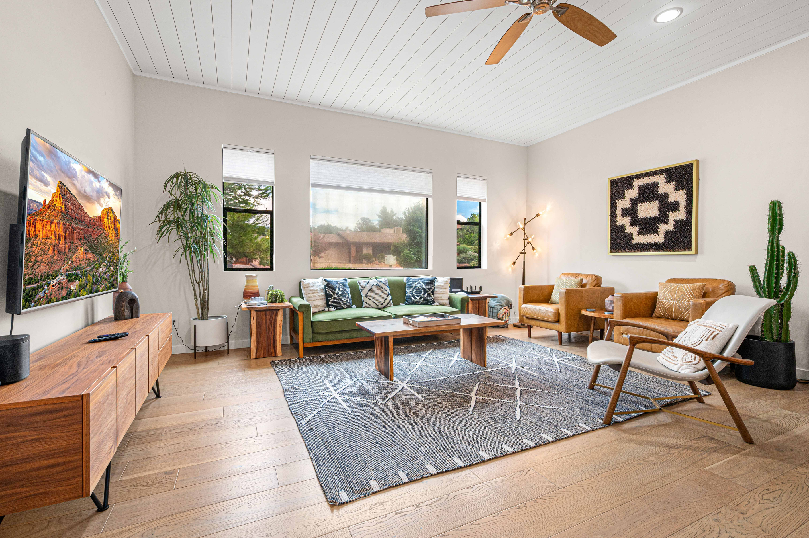 {Living Room} Bright, airy and designed for gathering — relax together in the spacious open-concept living room.