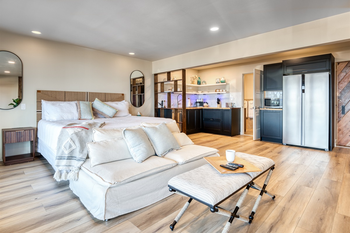 Seating in front of Bed - View of Kitchen Area