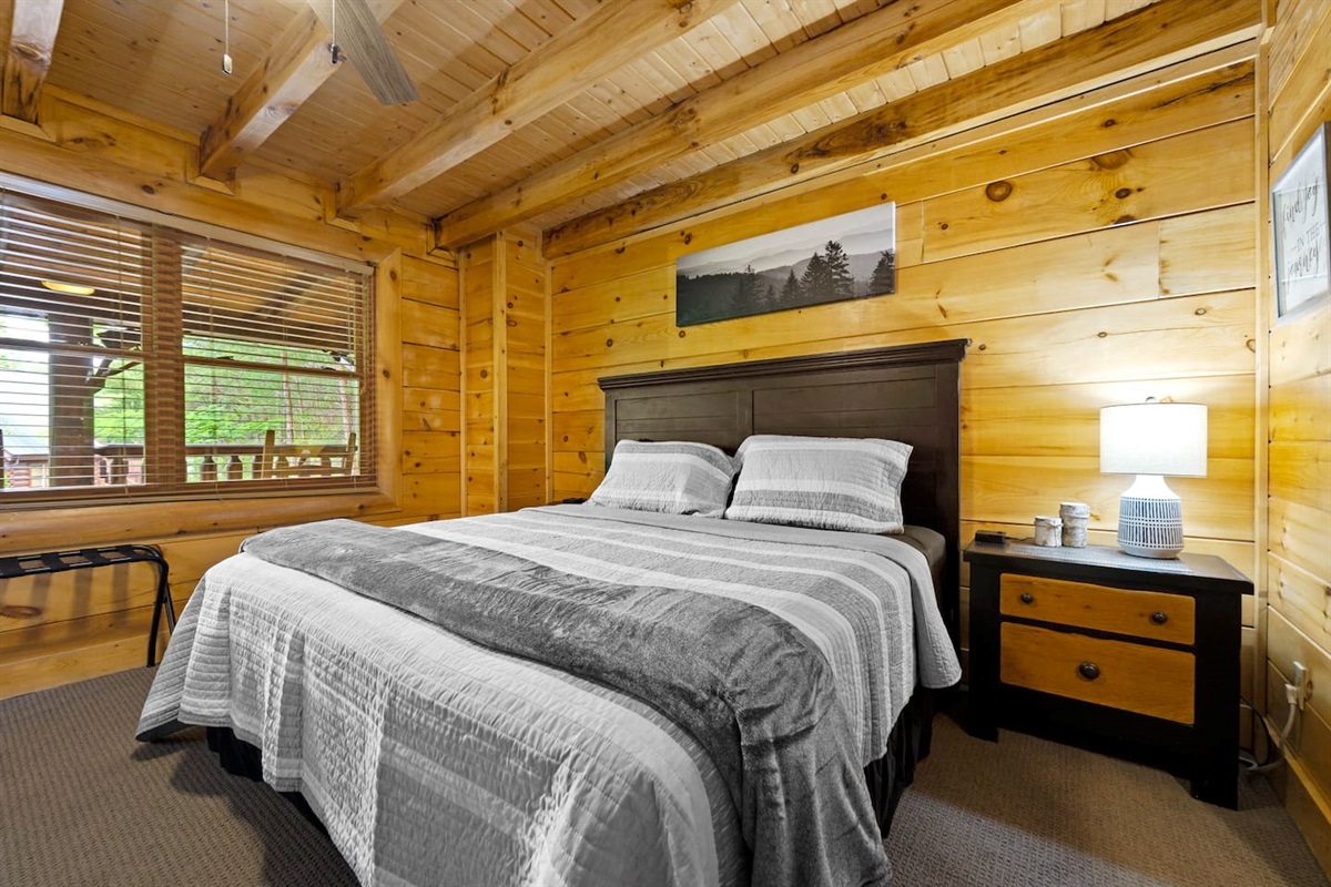 King bed in the front bedroom.  Bedroom includes an en-suite bathroom.