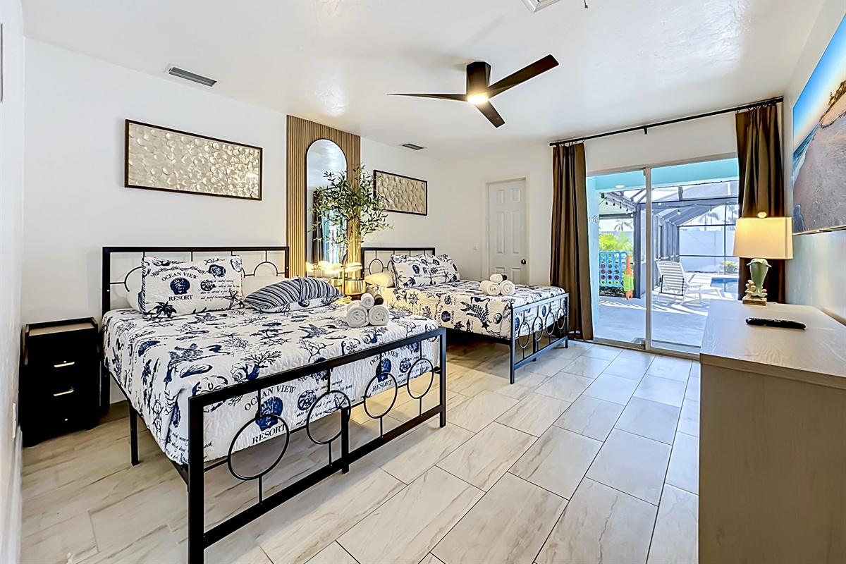 Our 3rd bedroom, with 2 full beds, and a smart TV - designed for comfort and convenience. 