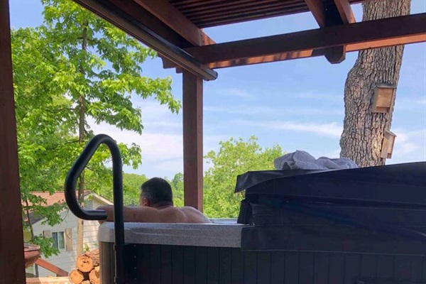 Safety rails and wide sets make it easy to enter and exit the hot tub. 