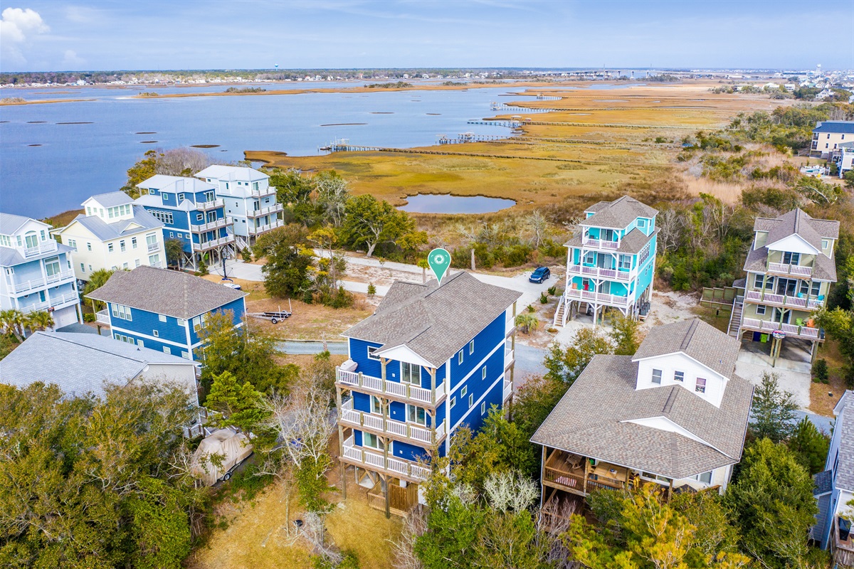 Your coastal getaway from above—soak in the ICW views, enjoy morning coffee on one of the many balconies, and let vacation mode take over!
