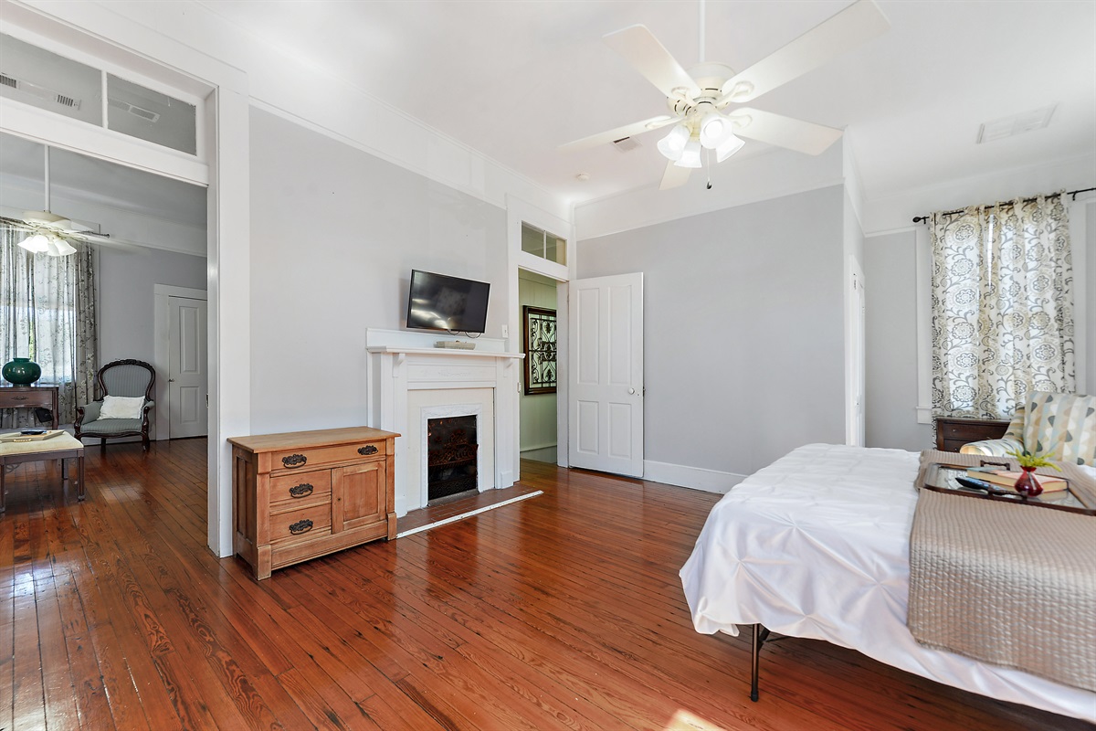 Bedroom 3. Upstairs. King bed. Smart tv. Looking into bedroom 4.