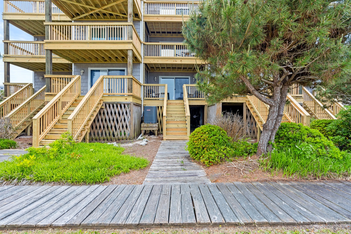 Direct boardwalk access leading from the home to the water and beach