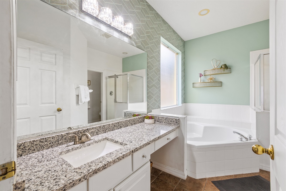 Spacious Bathroom with Jacuzzi and Walk In Shower
