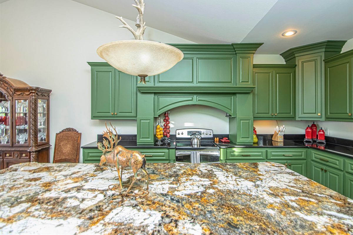 Green and Gold Accents Throughout the Kitchen for a Modern Yet Rustic Feel