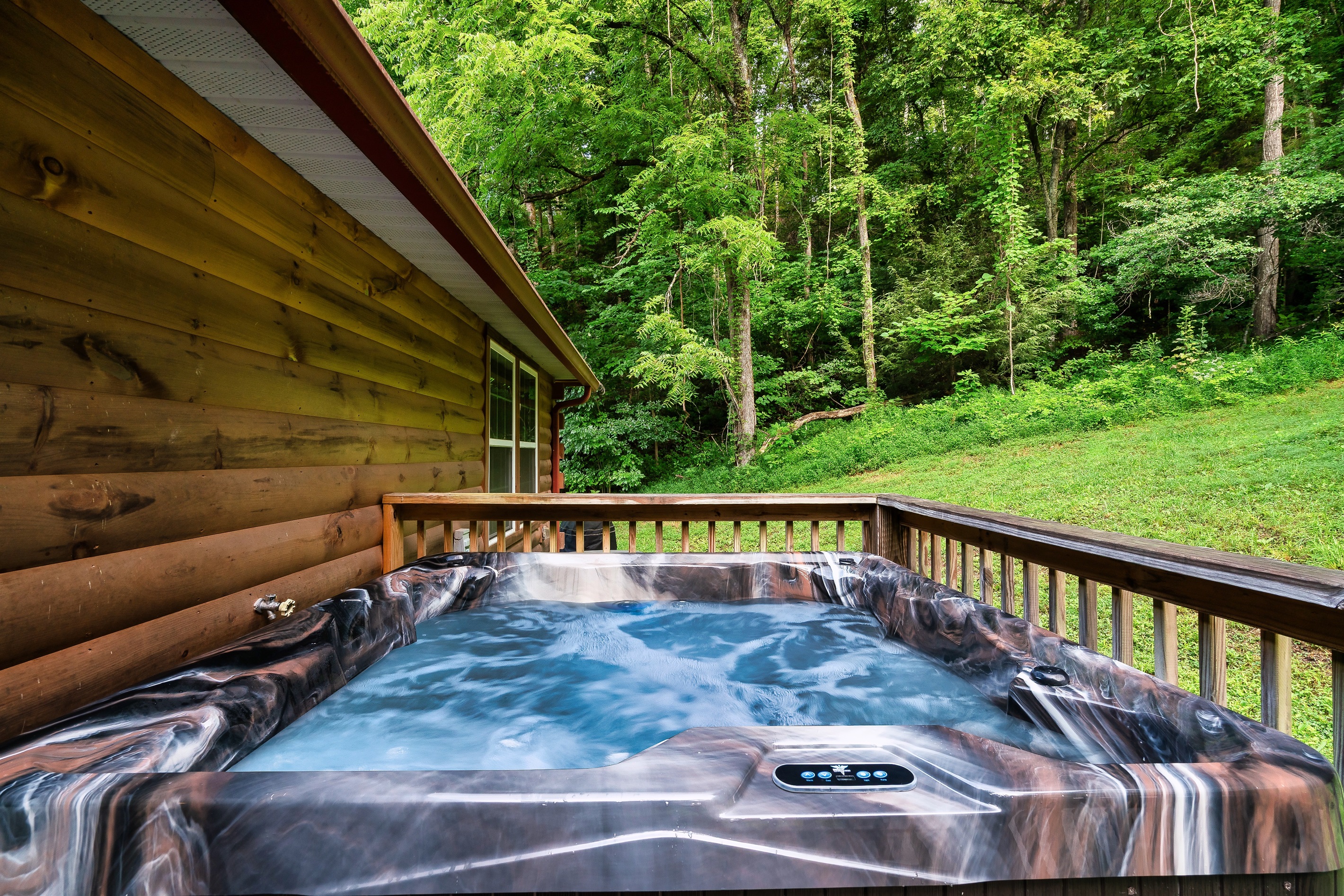 Relax and unwind in your private hot tub retreat