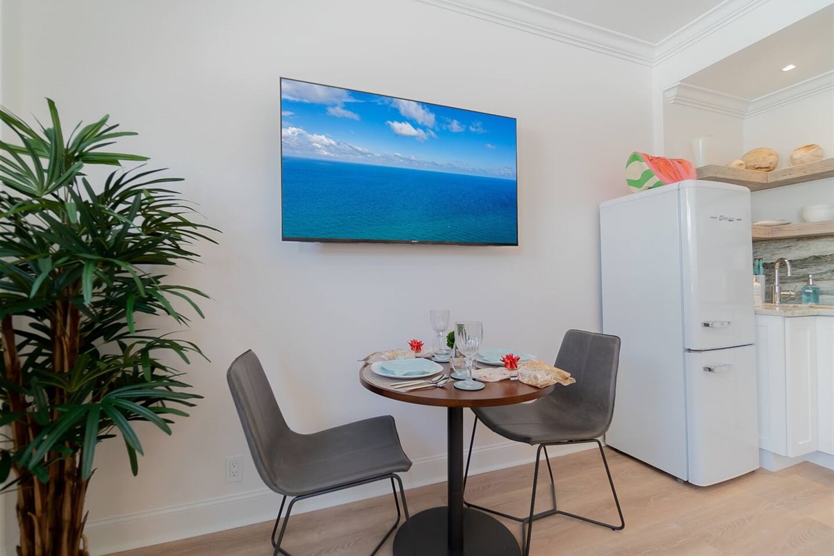 Table 30" round and leather chairs from West Elm.  Start your day with a lovely breakfast.  