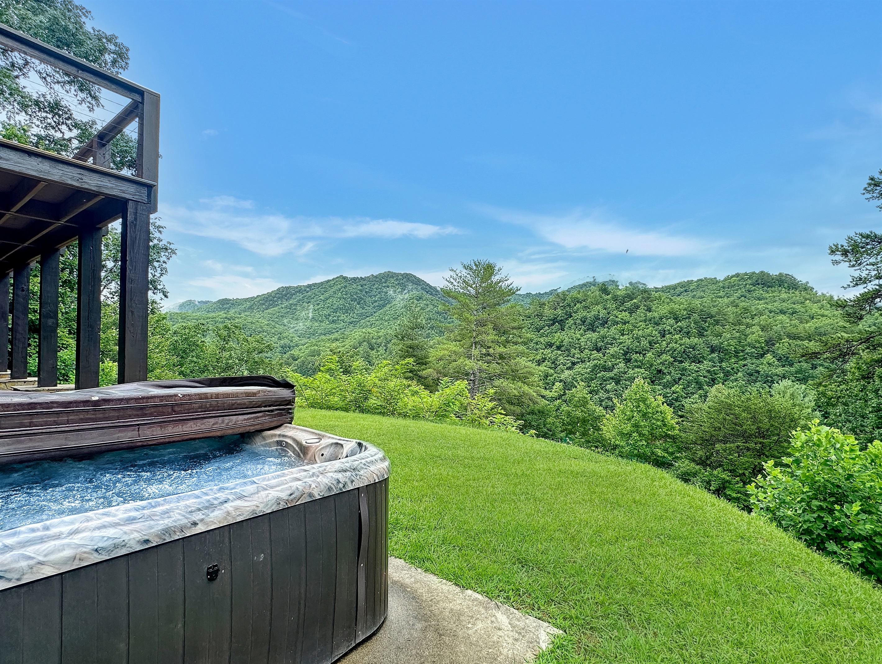Hot Tub: Unwind in the bubbling hot tub while soaking in breathtaking mountain views!