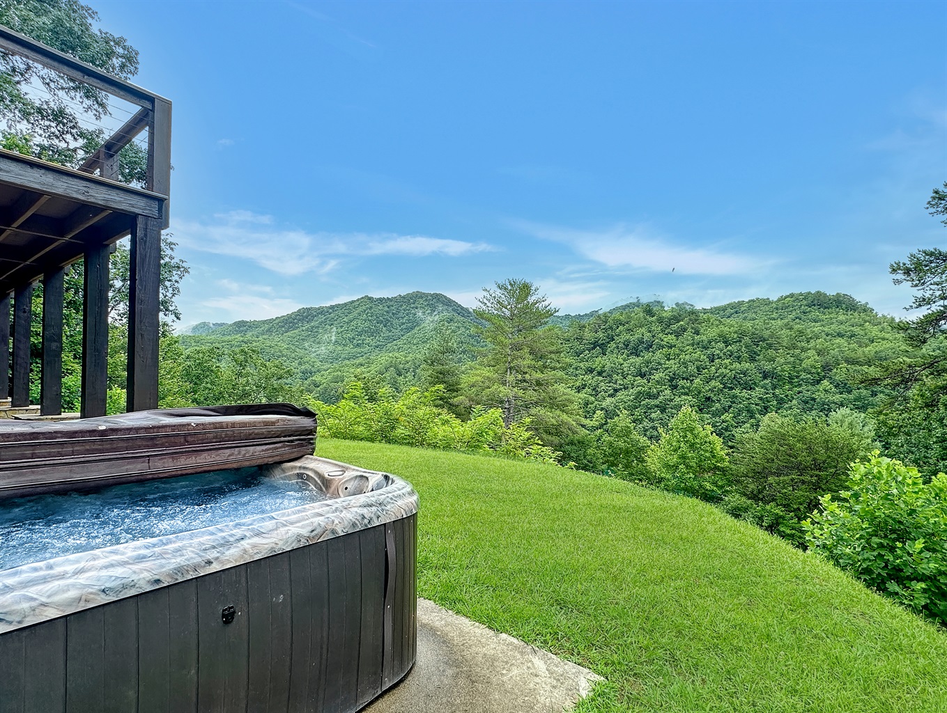 Hot Tub: Unwind in the bubbling hot tub while soaking in breathtaking mountain views!