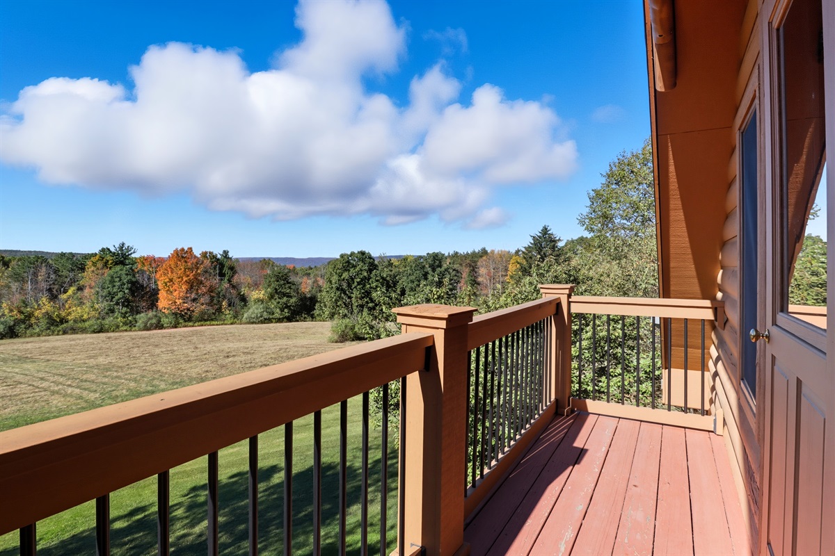 Deck access with views of nature and fresh air.