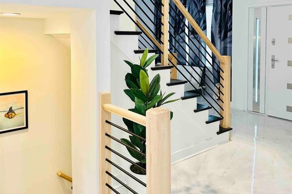 Stairway to heaven - a beautiful sight to behold. The chandelier falls like a rainfall down into the space below.