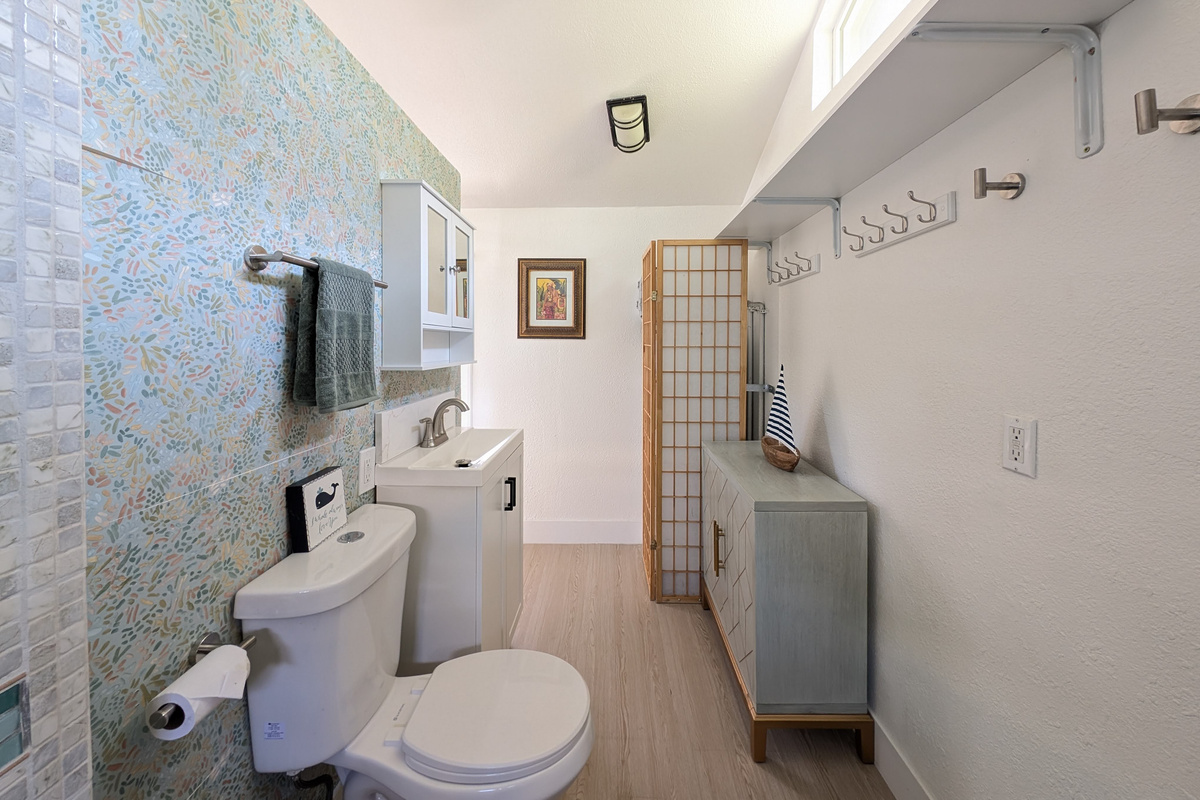 Roomy bathroom with convenient storage space.
