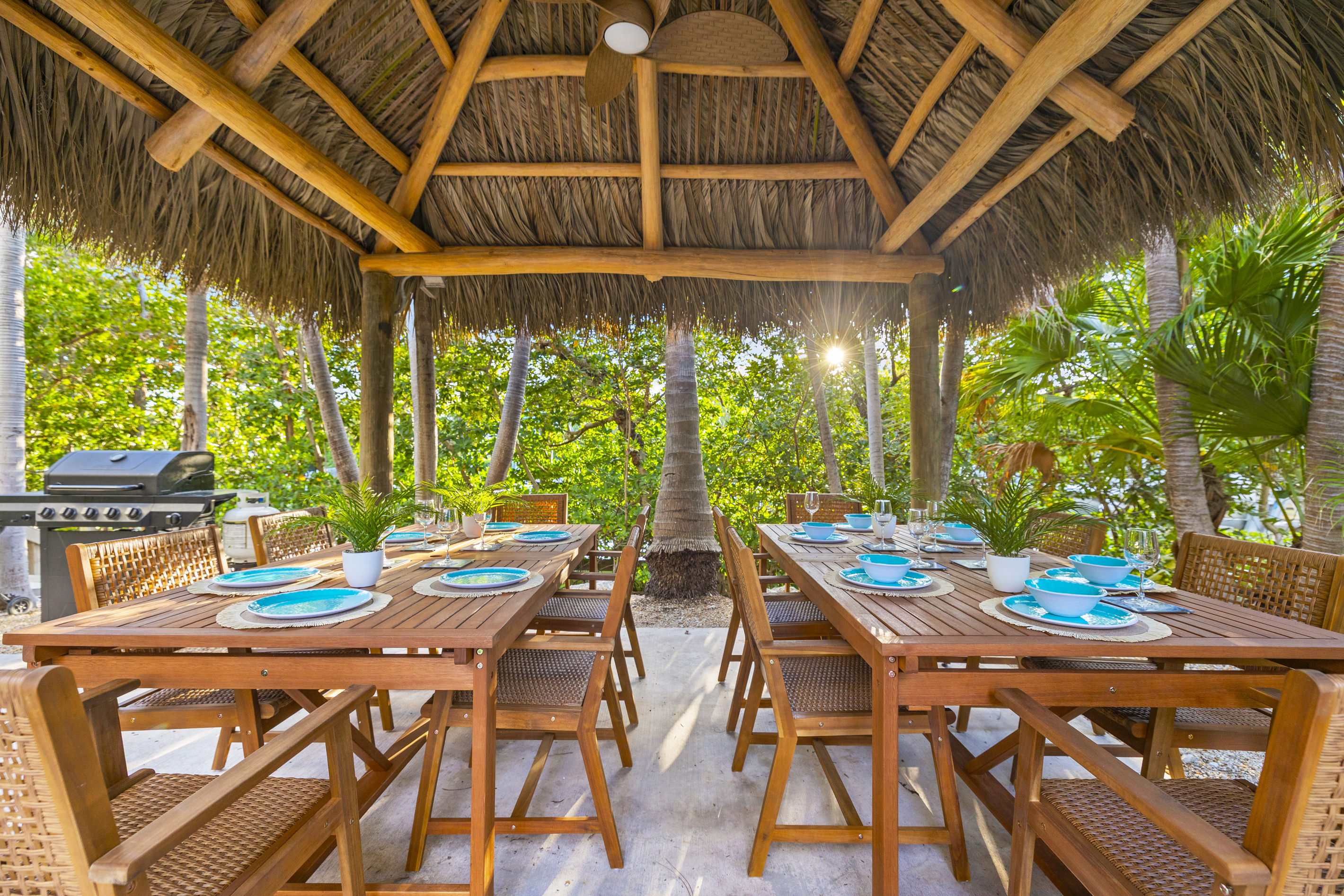 The first of two outdoor tiki huts, this one is set up for your entire family to dine outside, with space to seat 12.