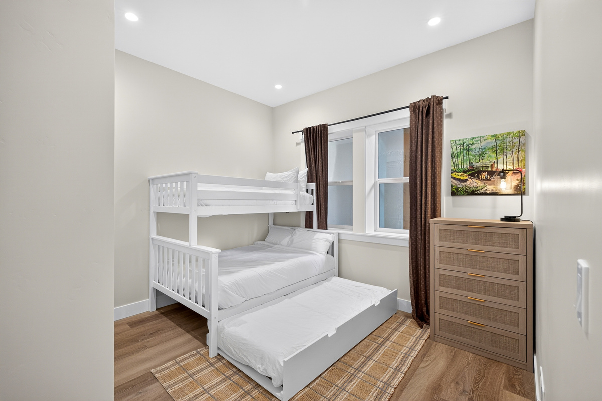 4 kids can sleep (or giggle) all night long in this twin over full with twin trundle.