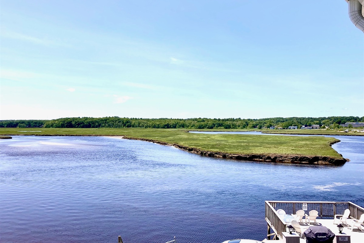 The beautiful view of the marsh from the common porch area, with Wells Beach just a 2 minute walk away