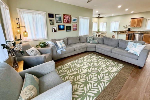 Living Room | Representative Interior. Finishes, decor, and furniture, vary by duplex unit.