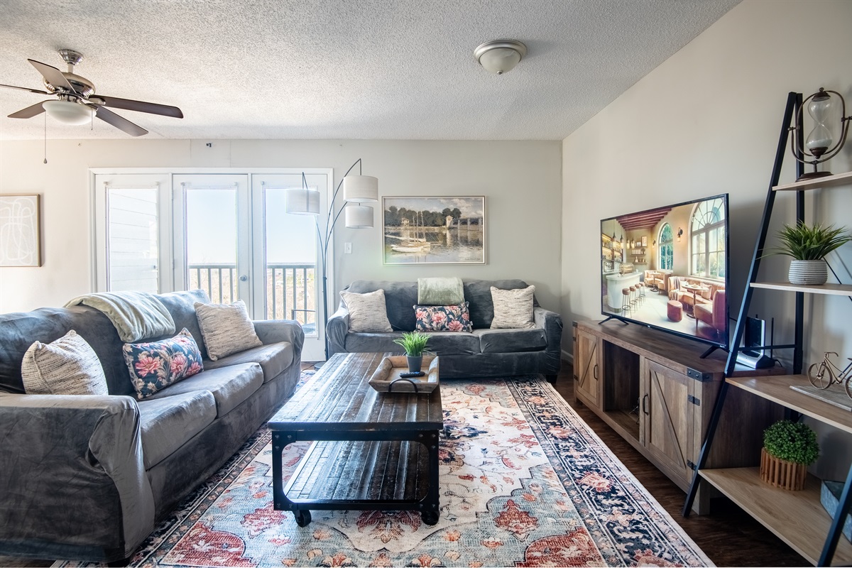 Welcome to Ridge Retreats Unit F! The natural lighting gives the coziest vibes. The living room offers plenty of space to lounge on the couches and watch your favorite movies or catch the big game!