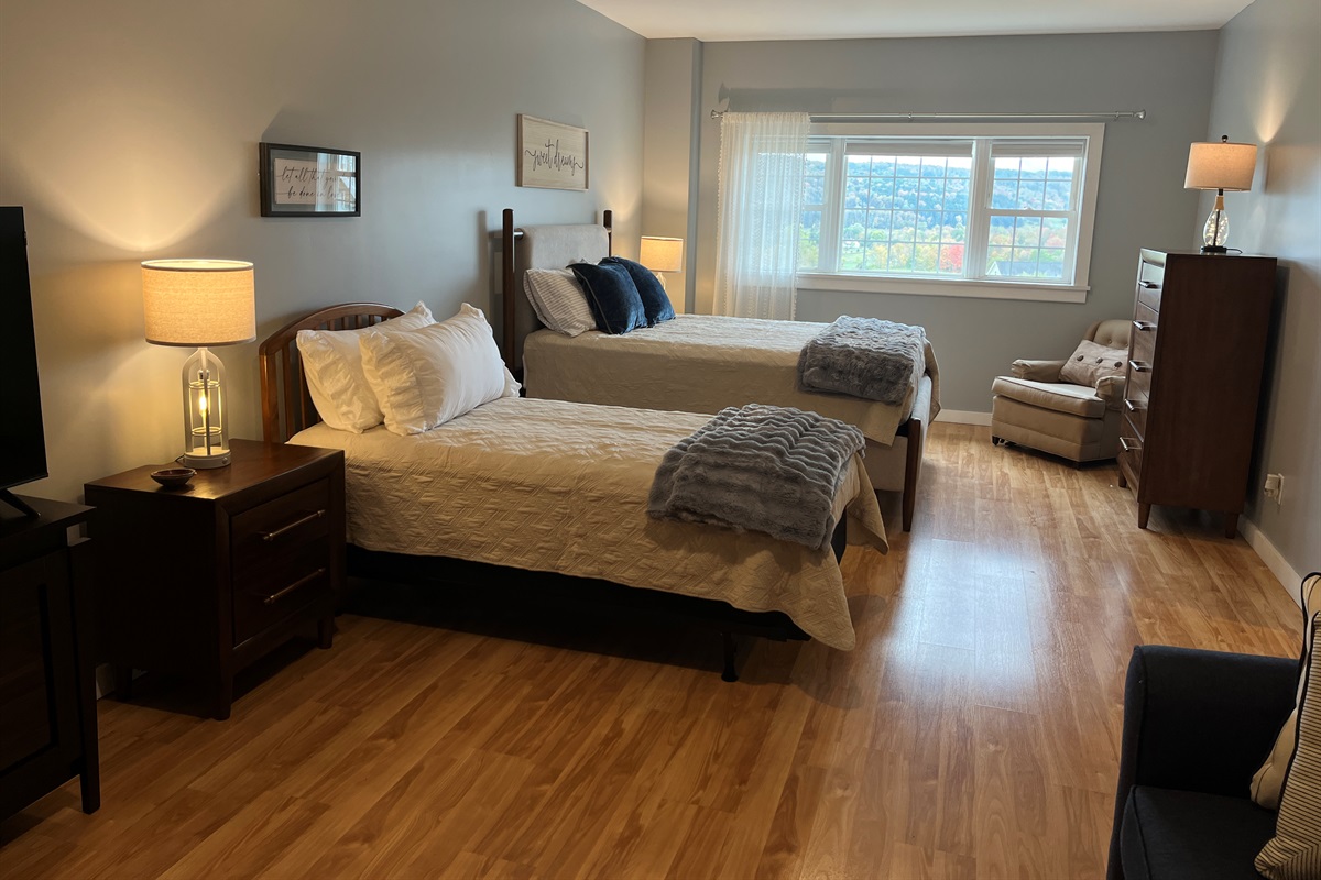 Lower level Family suite with Queen, Twin and lounge area