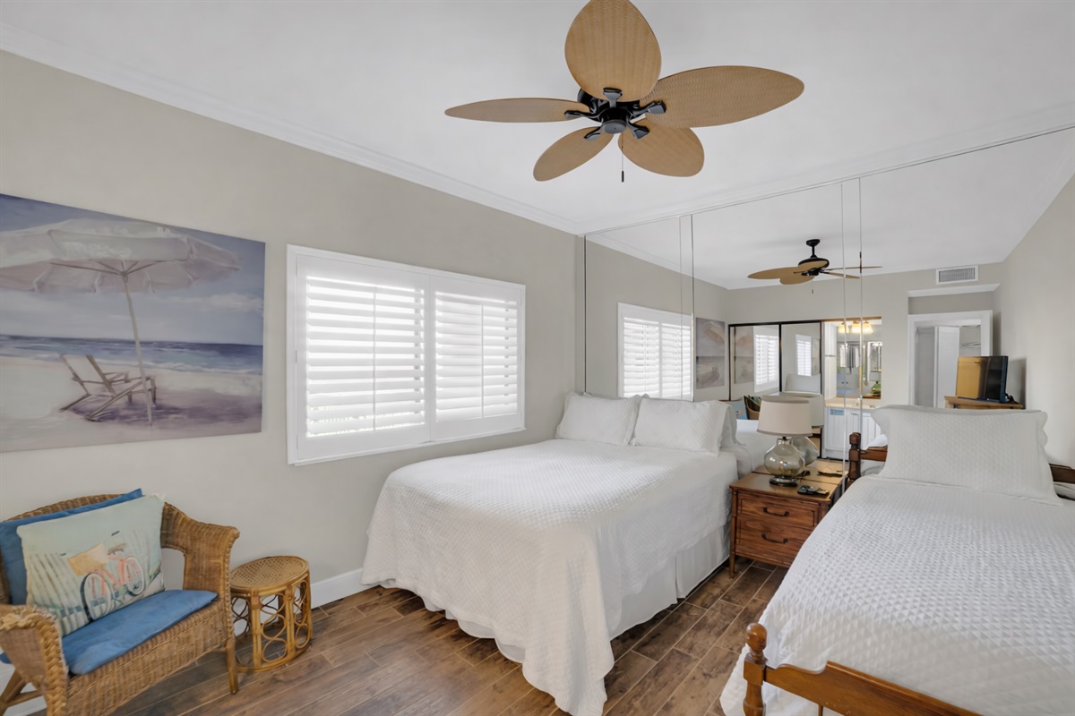 Guest bedroom will accommodate 3 guests. I will be removing the mirror wall, putting a new fan with light kit in, wall mounting a smart tv and a vanity.  